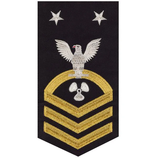 Navy E9 MALE Rating Badge: Machinist's Mate - seaworthy gold on blue